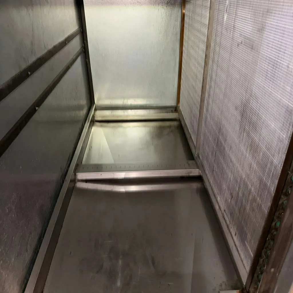 Clean commercial air handler drain pan after professional service in Katy, TX