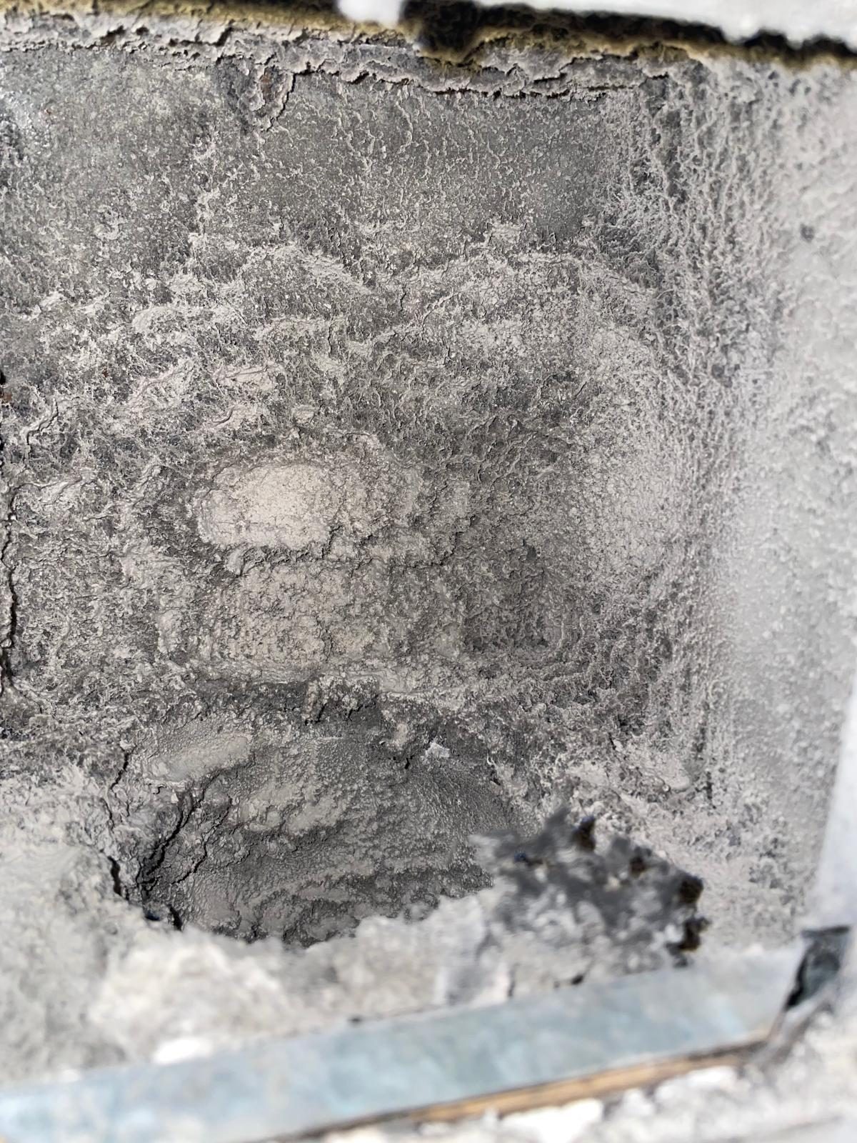 Compacted lint inside a dryer vent at 3525 Sage Condominiums, Houston
