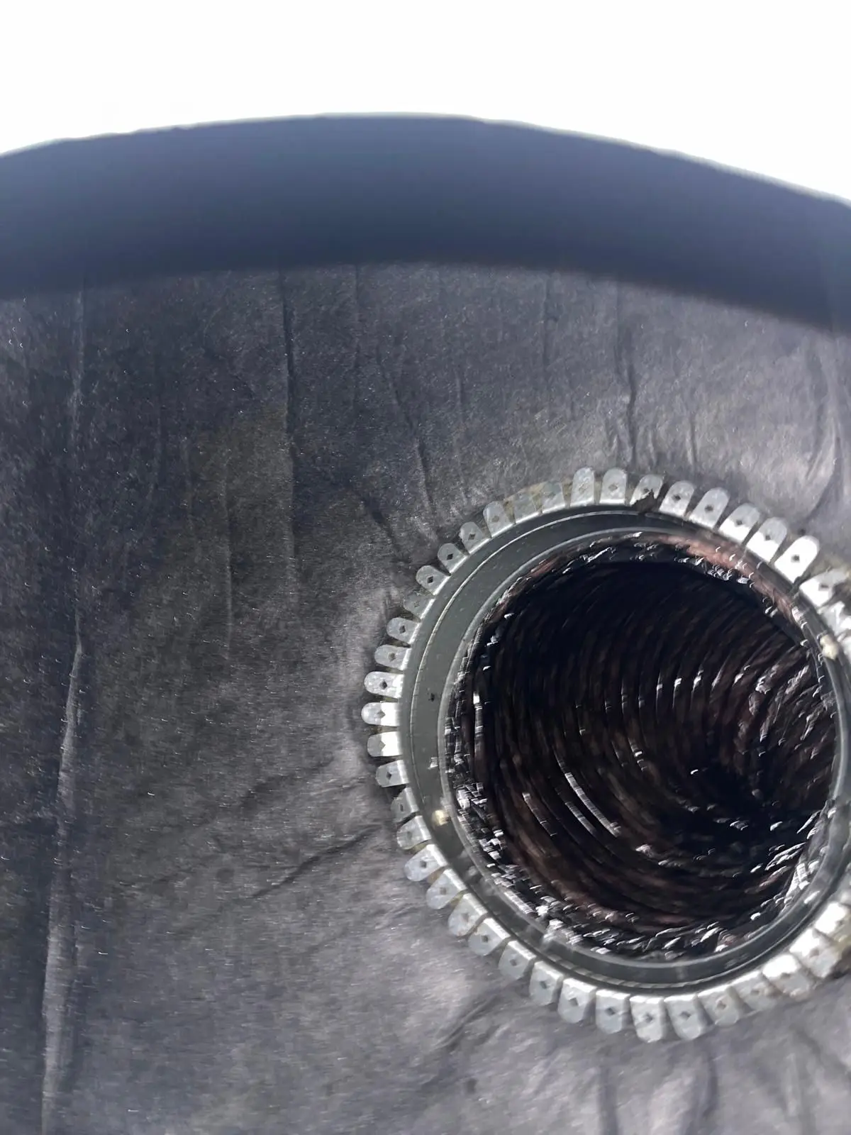 Cleaned flex duct takeoff connection after professional air duct cleaning service in Magnolia TX