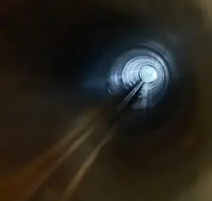 Dryer vent booster fan installed inline on the duct in a Cypress, TX attic