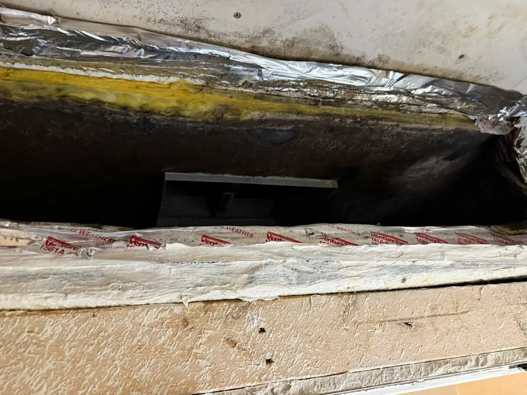 Ceiling plenum access opened for air duct cleaning in Katy, TX 77450