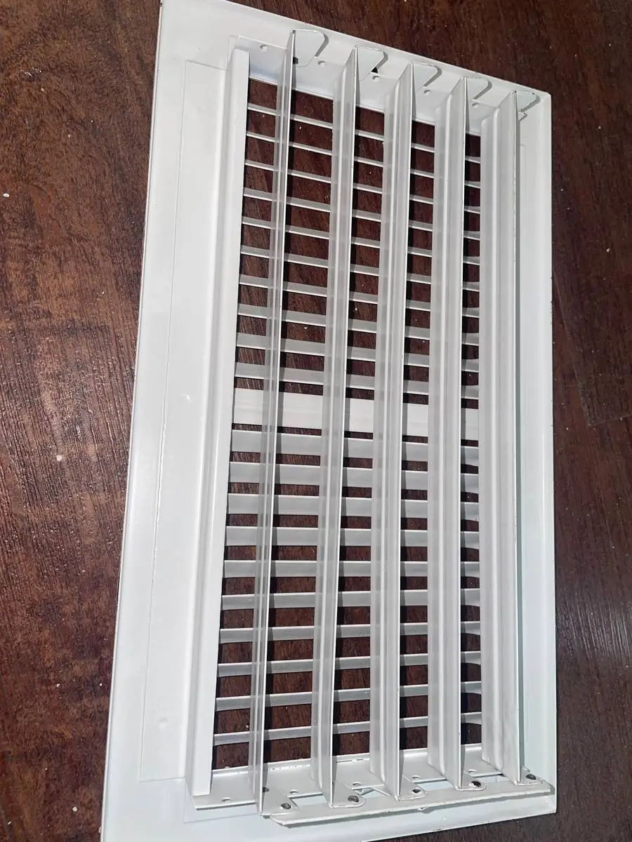 Supply air registers washed and ready to reinstall after duct cleaning in Montrose, Houston