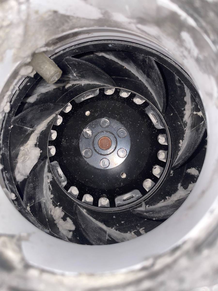 Clean dryer booster fan wheel after commercial dryer vent cleaning in Tanglewood, Houston