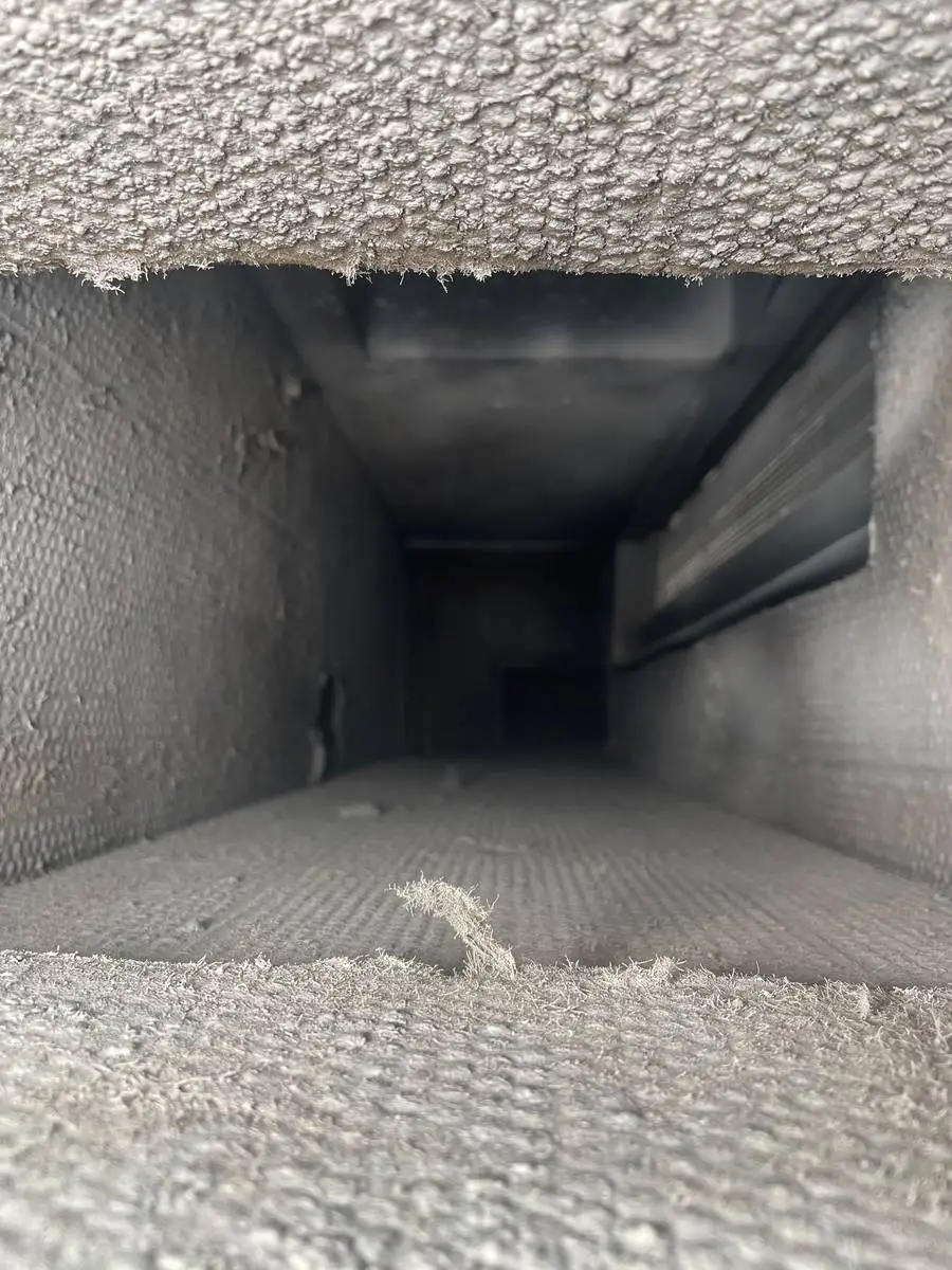 Clean supply duct interior after air duct cleaning at a Montrose apartment in Houston