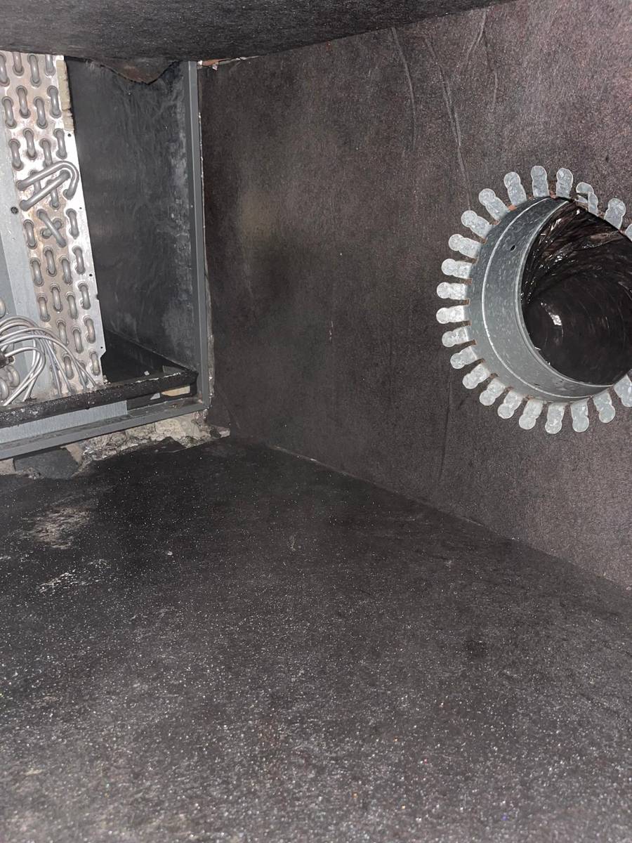 Clean plenum floor near the AC coil after air duct cleaning in Houston 77085