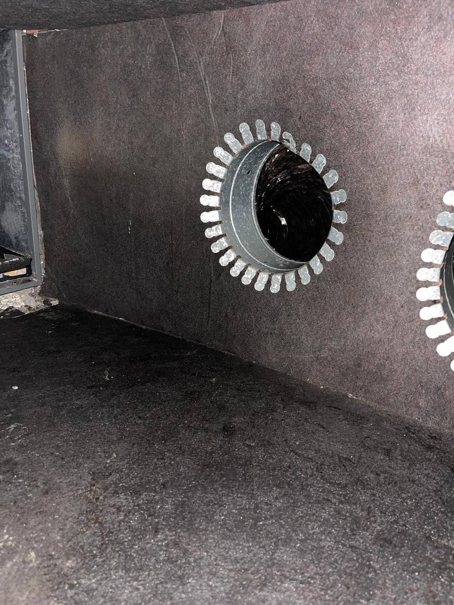 Clean plenum wall and supply collar after duct cleaning in Houston 77085